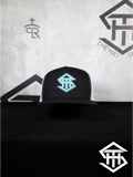 THS SnapBack 14 Black/White & Turquoise logo